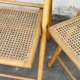 Pair of folding chairs with cane seat