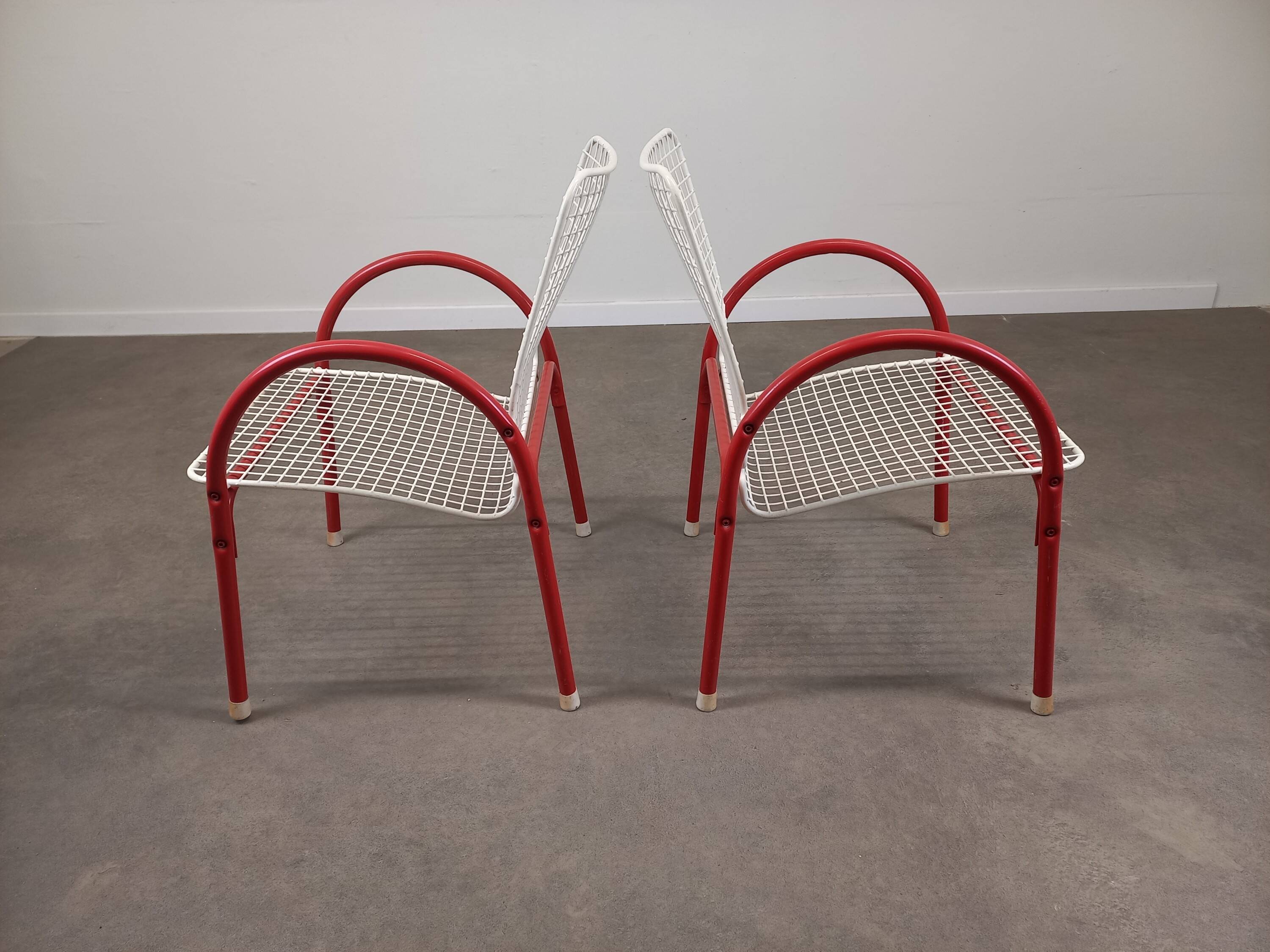 Pair of Emu Rio garden armchairs