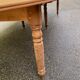 Round extendable banquet table stripped in solid mahogany with 4 extensions, 19th century.