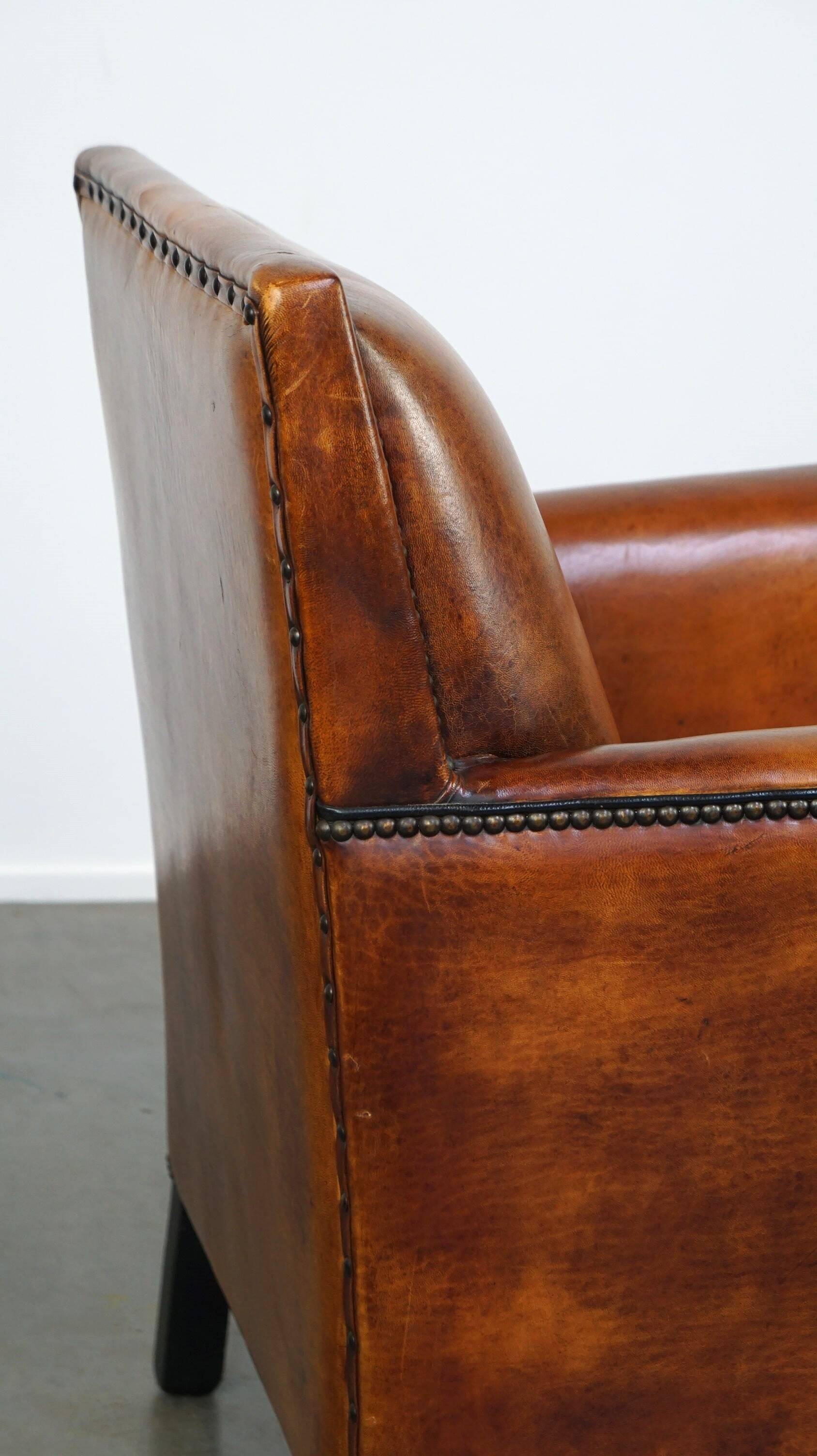 Sleek sheepskin Art Deco design armchair with beautiful details