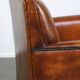 Sleek sheepskin Art Deco design armchair with beautiful details