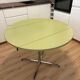 Round extendable folding Formica table with metal legs from the 50s/60s in green.