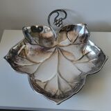 Old empty cut pocket in silver metal art nouveau in the shape of a sheet