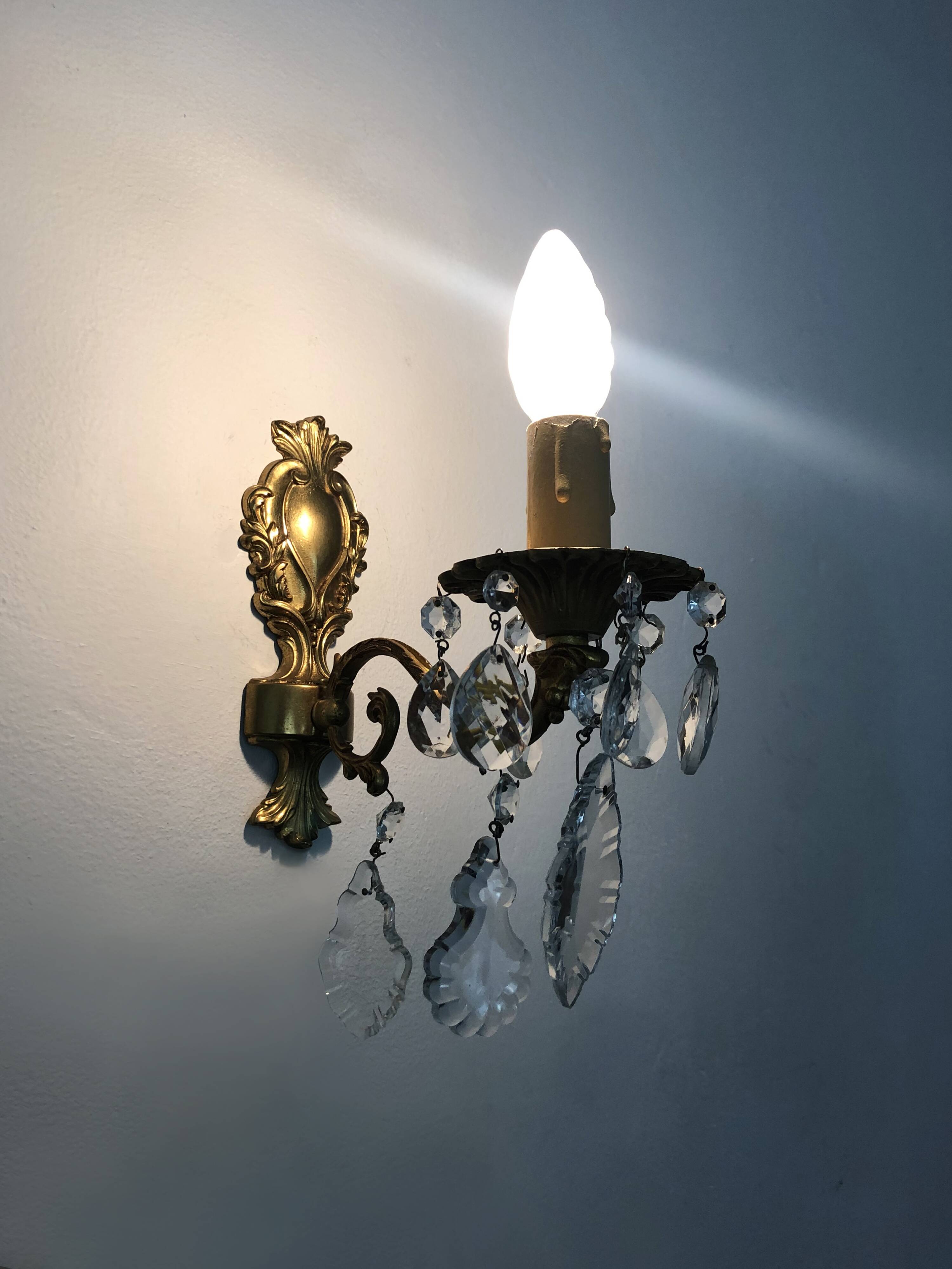 Pair of wall sconces in bronze and glass pendants from the 1970s.