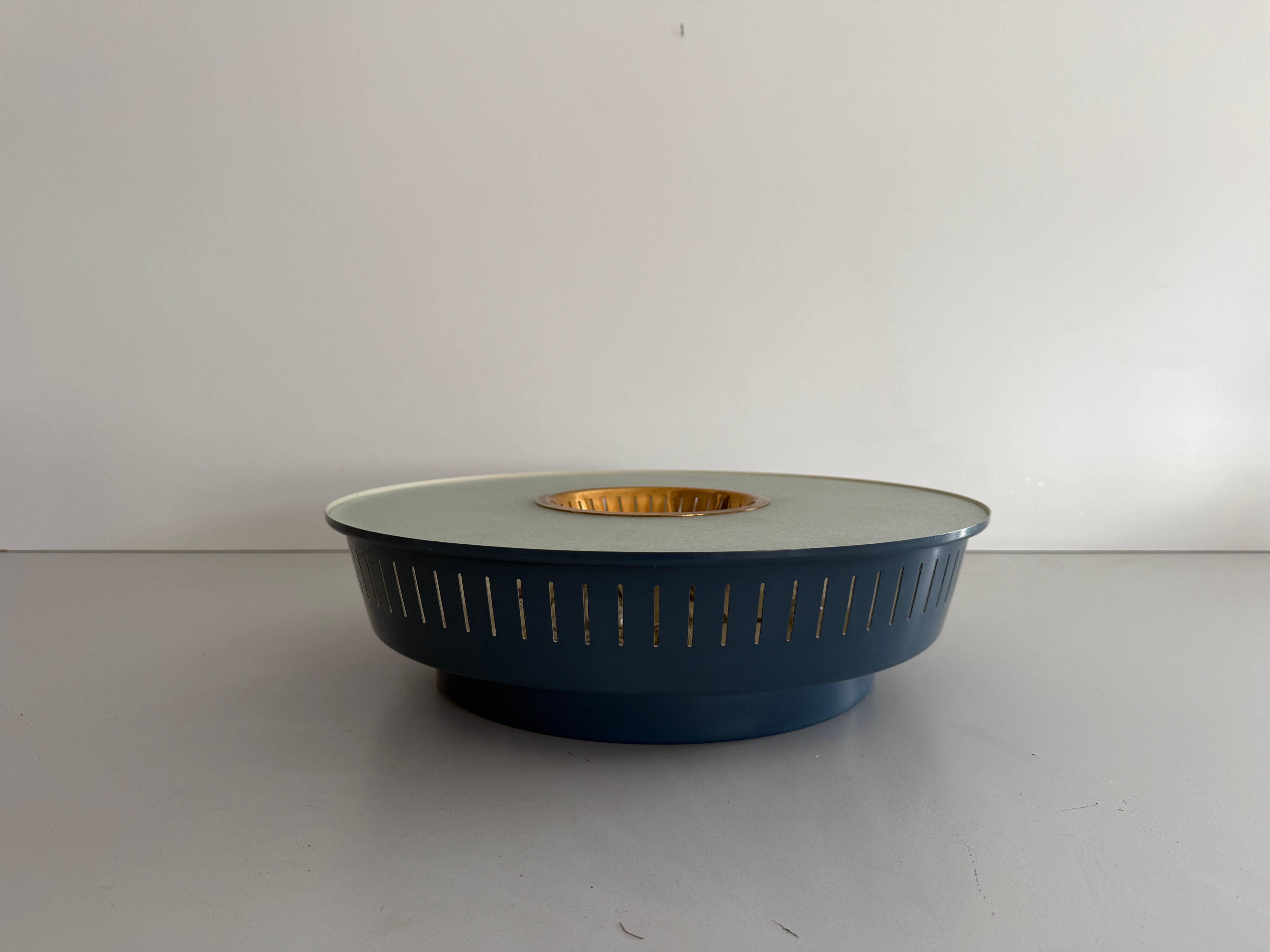 Flush-mounted metal frame with dark blue glass, Attributed to Stilnovo, 1950s, Italy.