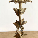 Candlestick in gilt bronze decorated with leaves