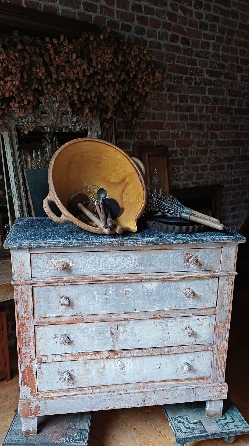 Antique piece of furniture with a grey patina.