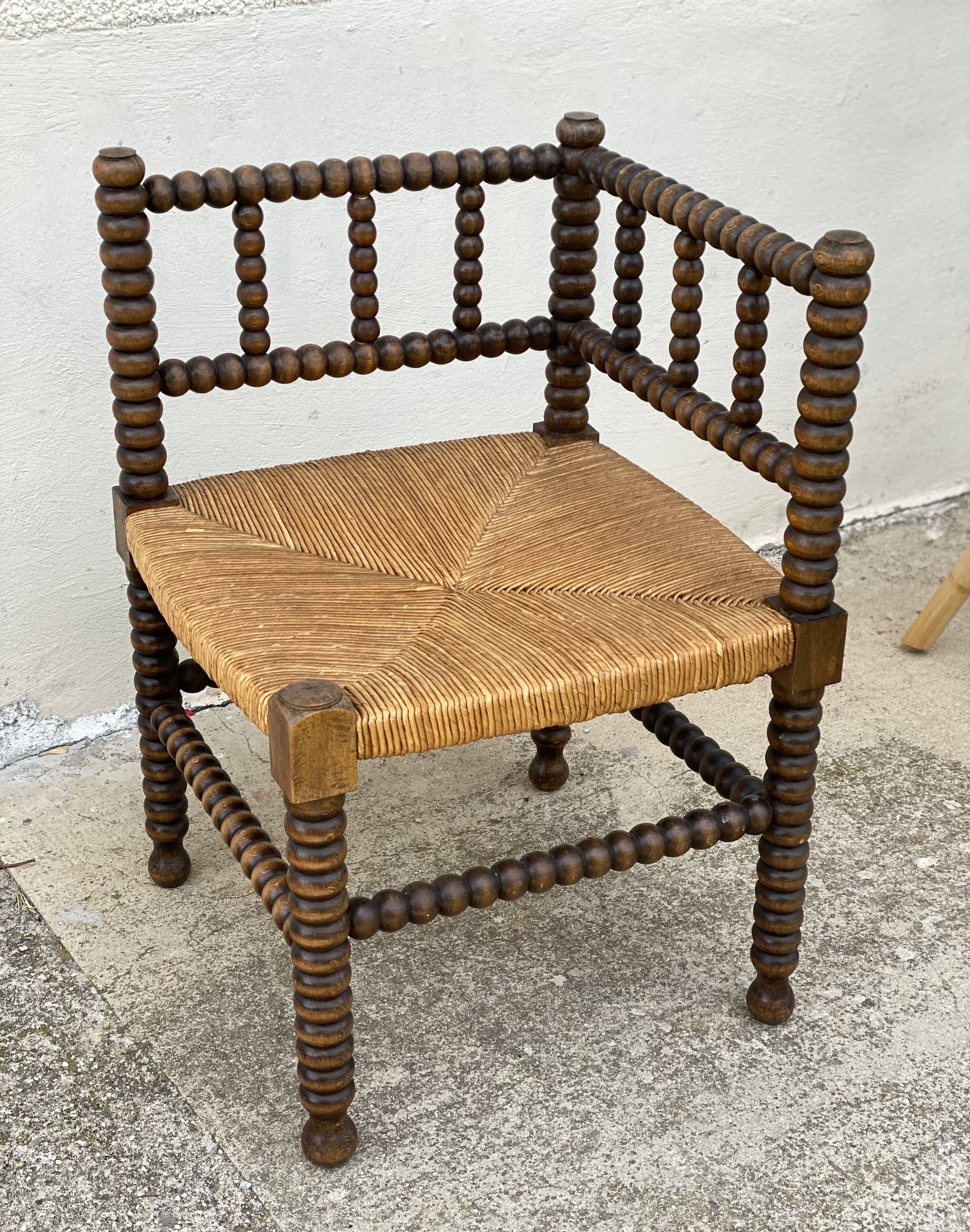Art Deco turned wood straw corner armchair