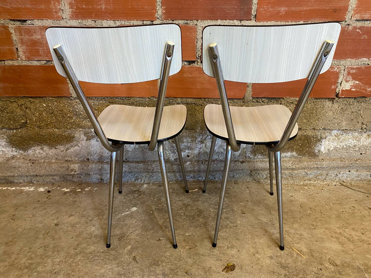 Pair of antique chrome metal chairs + white formica seat & back