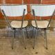Pair of antique chrome metal chairs + white formica seat & back