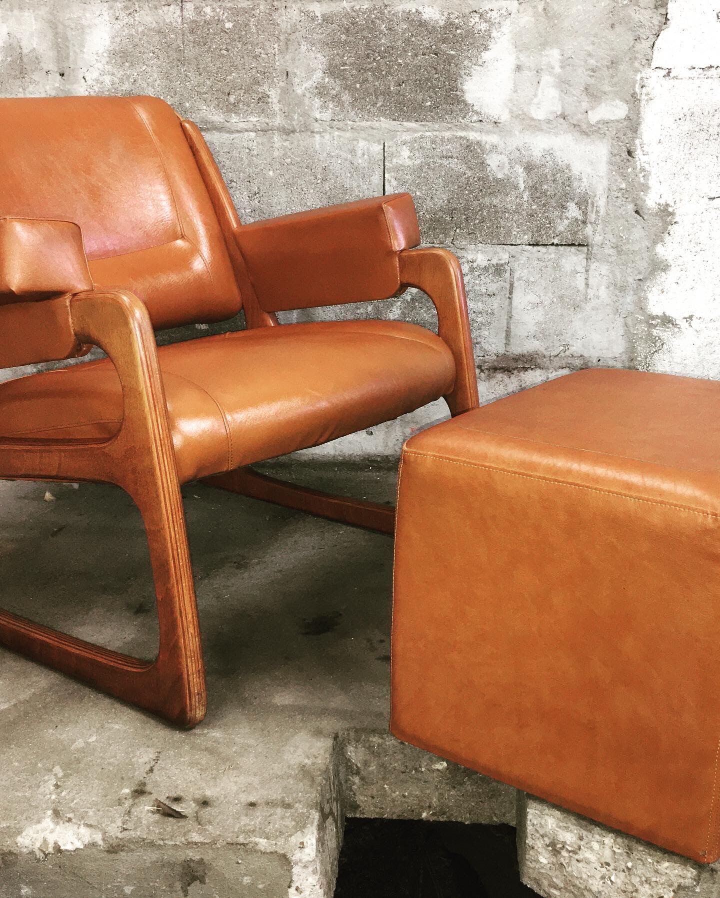 Armchair called "sled" Publisher Baumann and Ottoman