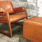 Armchair called "sled" Publisher Baumann and Ottoman