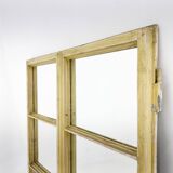 Vintage wooden window converted to a mirror