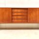 Danish teak sideboard with two sliding doors and 4 central drawers