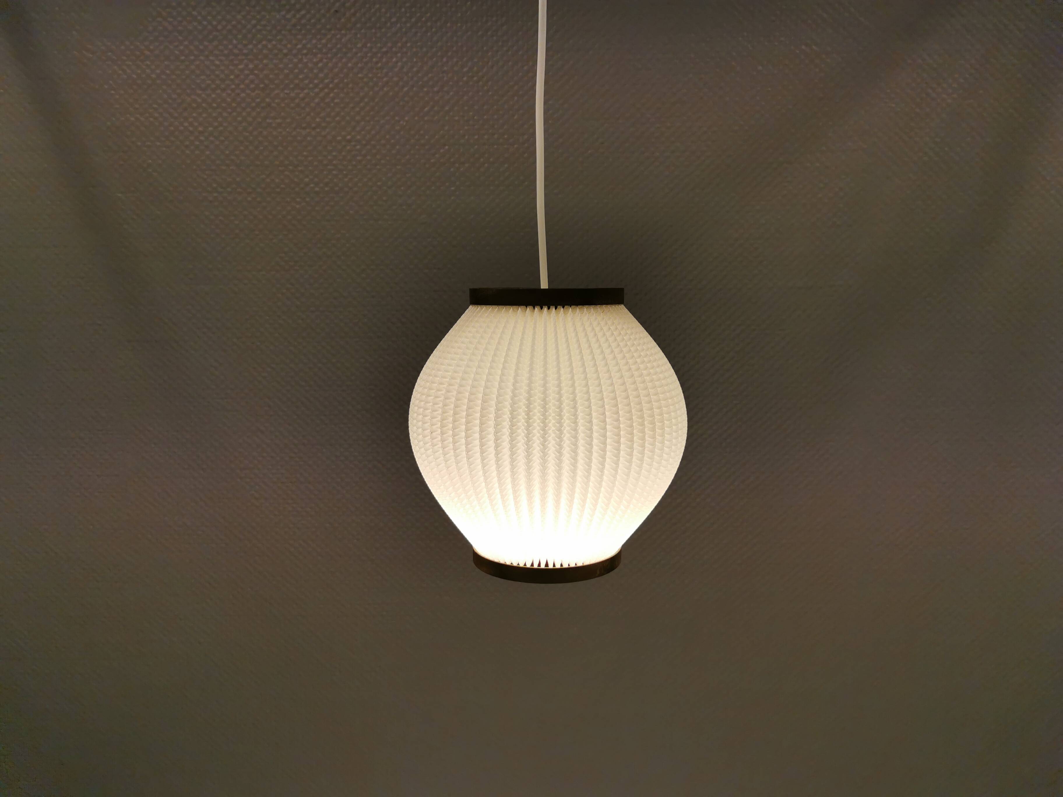 Pleated hanging lamp model Pearl Shade, produced by Hoyrup Light and designed by Lars E Schøiler