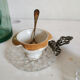 Silver and porcelain cockroaches