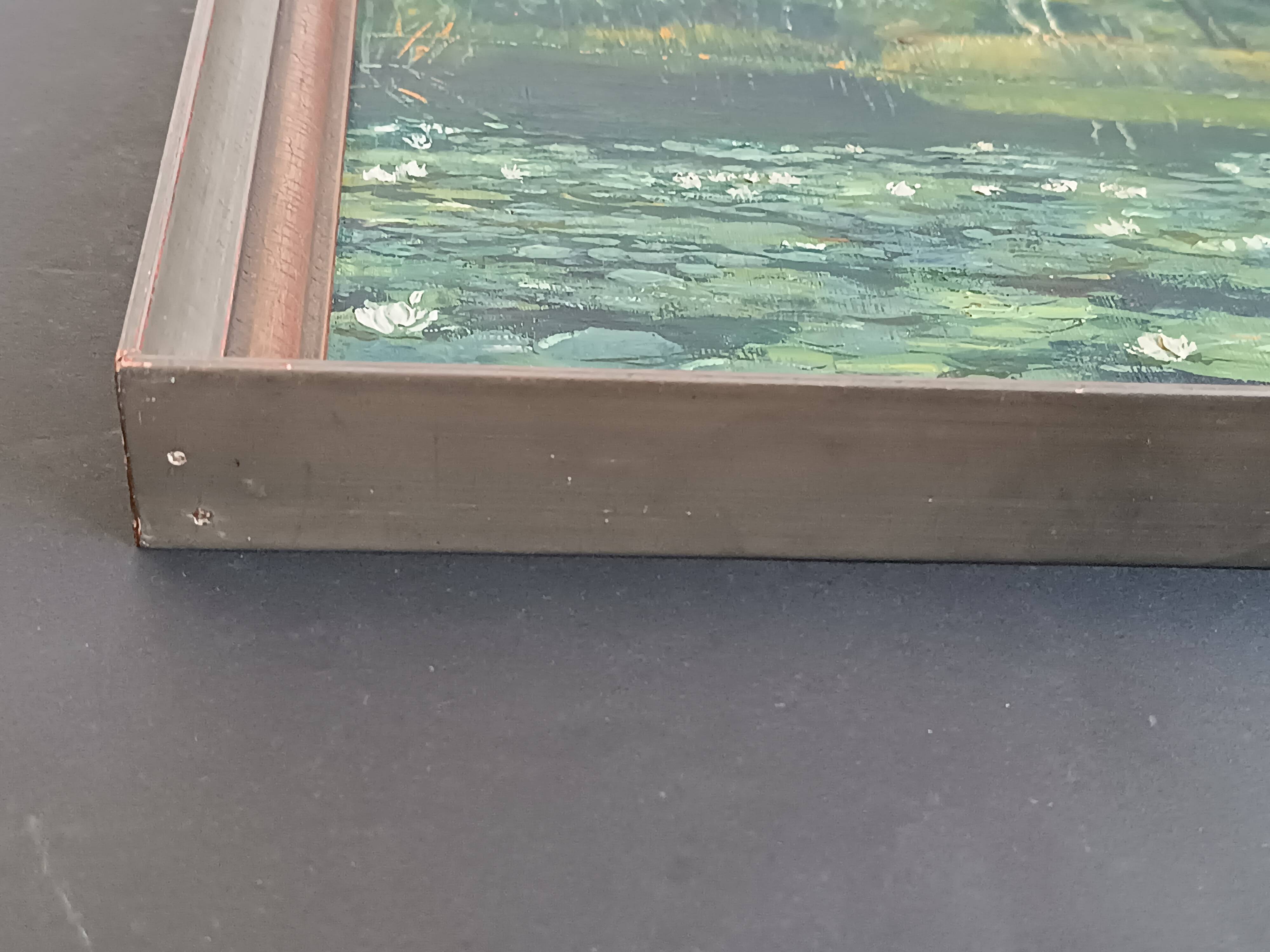 Original oil painting of a landscape with a pond and water lilies by Albert Morhain, 1930.