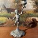 Old cherub candle holder