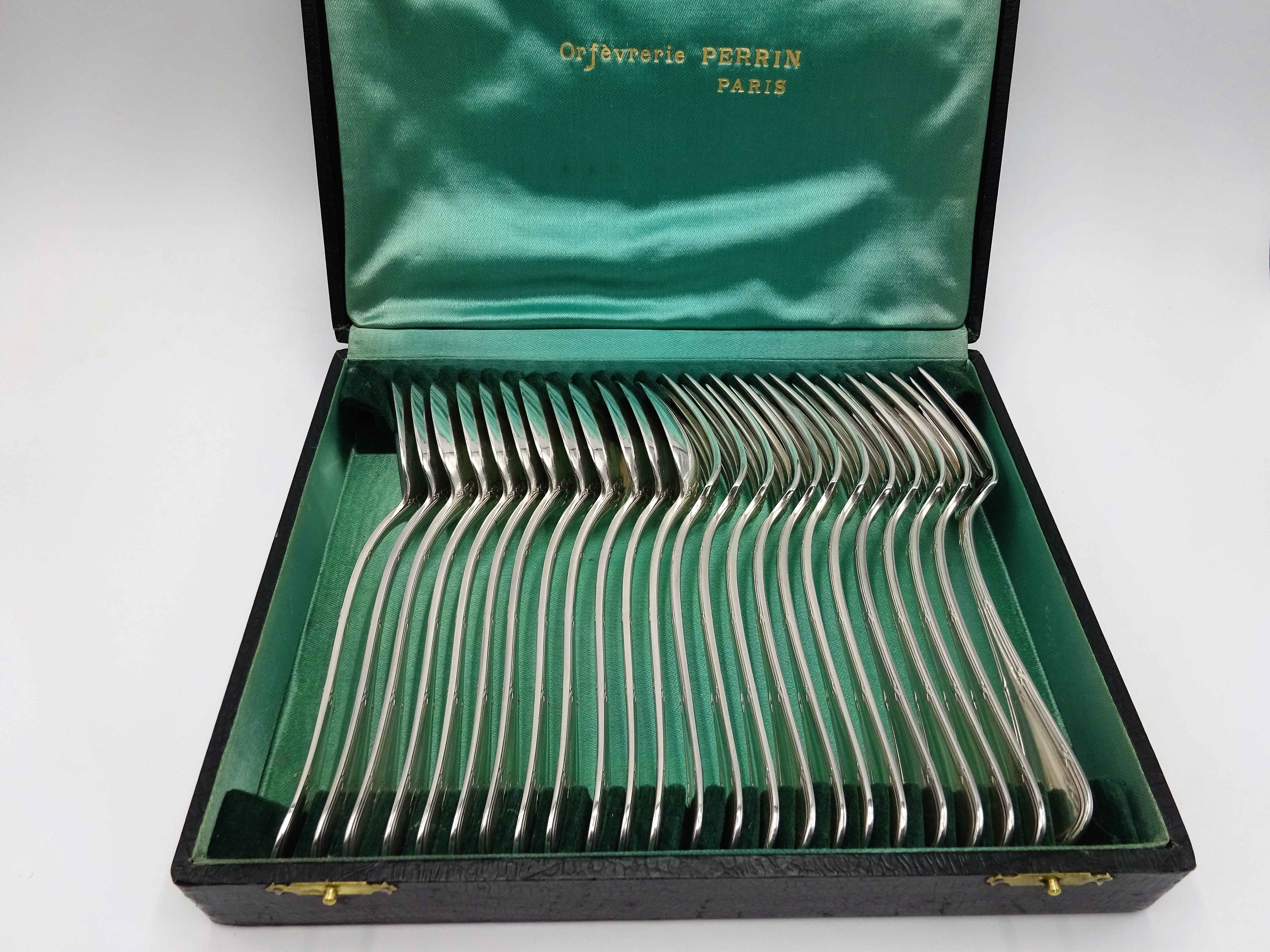 Set of 24 dessert cutlery in silver metal