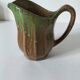 Handcrafted green and brown glazed ceramic pitcher, 1960s-70s
