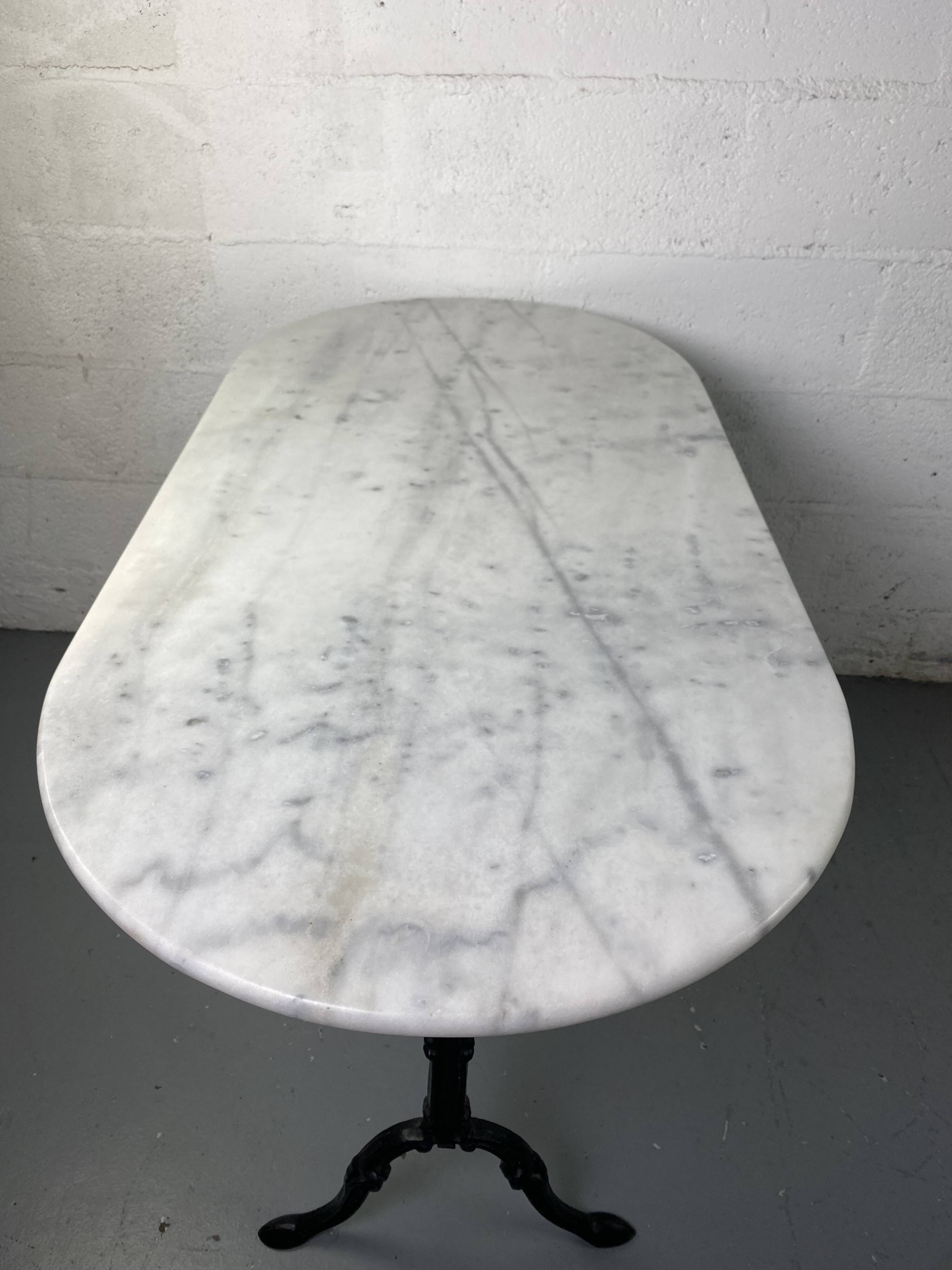 Marble and wrought iron bistro table