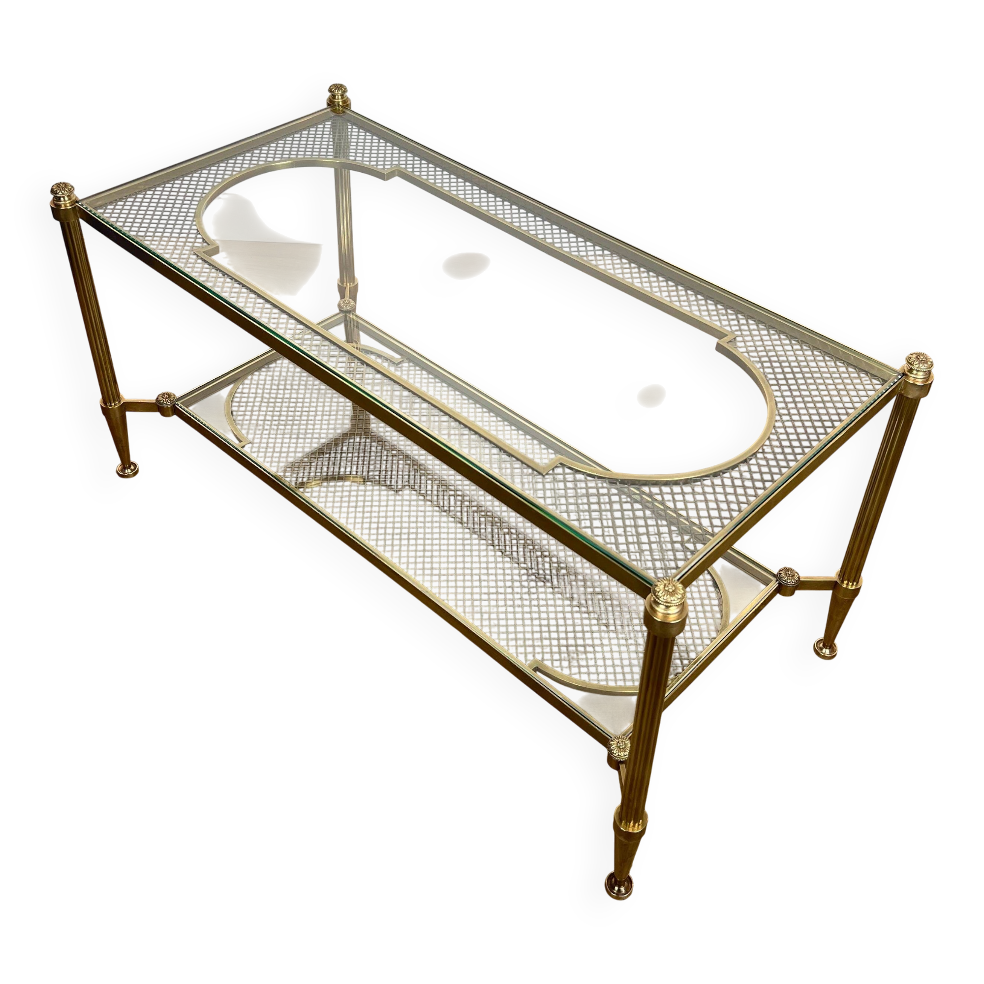 Rare bronze, brass, and steel mesh coffee table with a double glass top resting on a brass mesh. French work by Jansen
