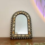 Oriental bone mirror