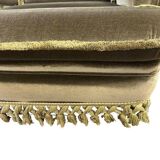 Vintage green two-seater sofa with fringes