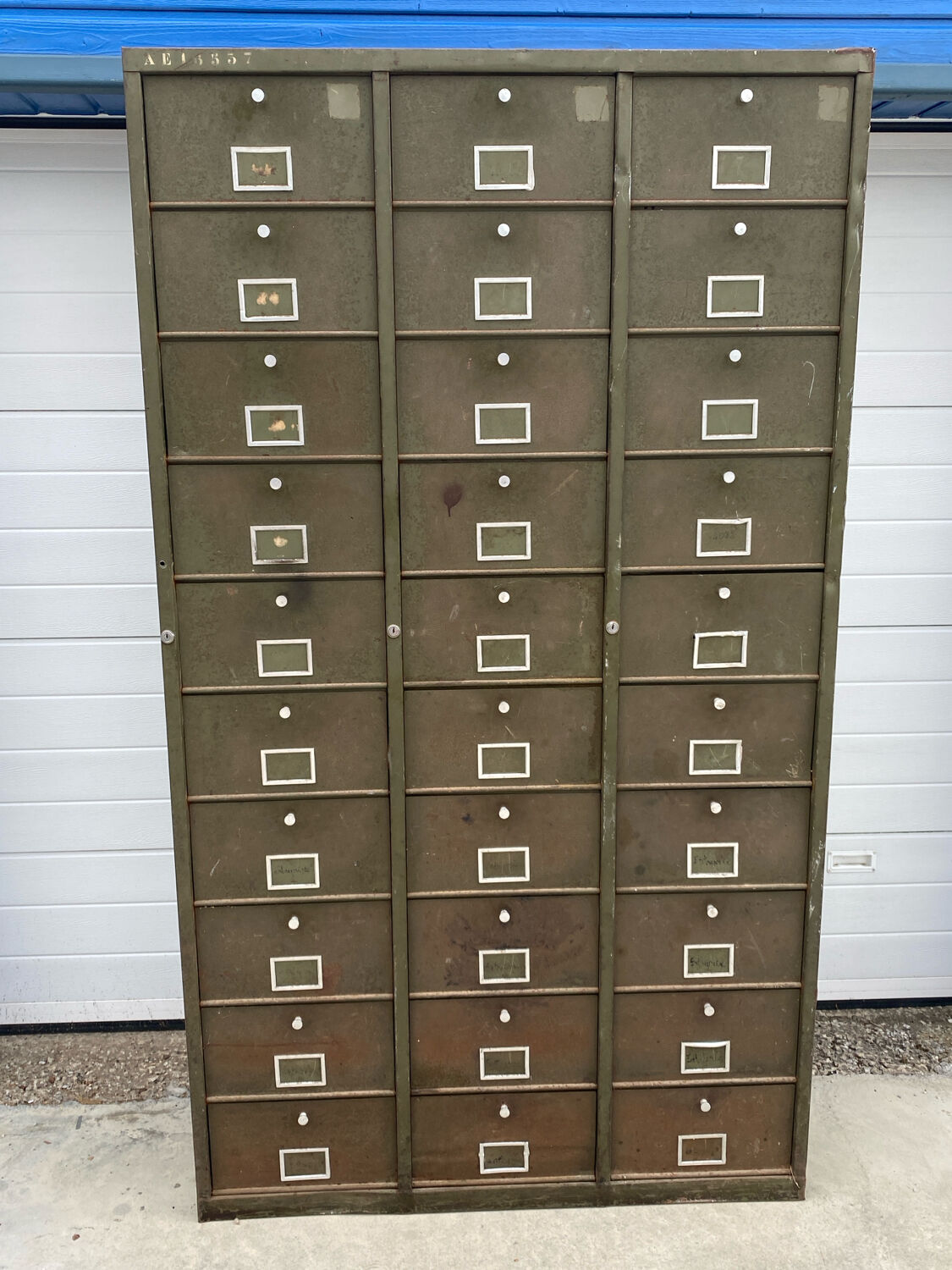 Military metal cabinet with hinged door