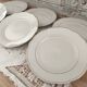 Set of 6 small white porcelain dinner plates with gold trim