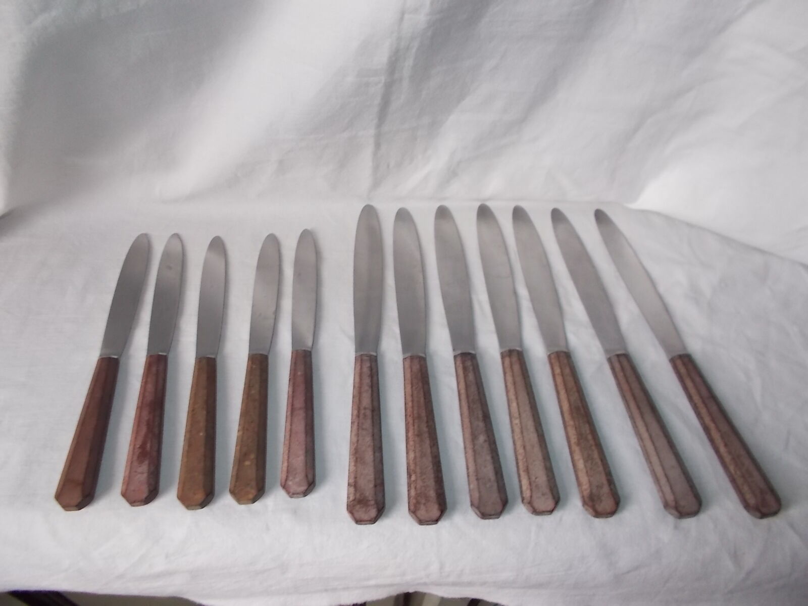 Set of brown Bakelite handle knives