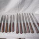 Set of knives with brown Bakelite handles.