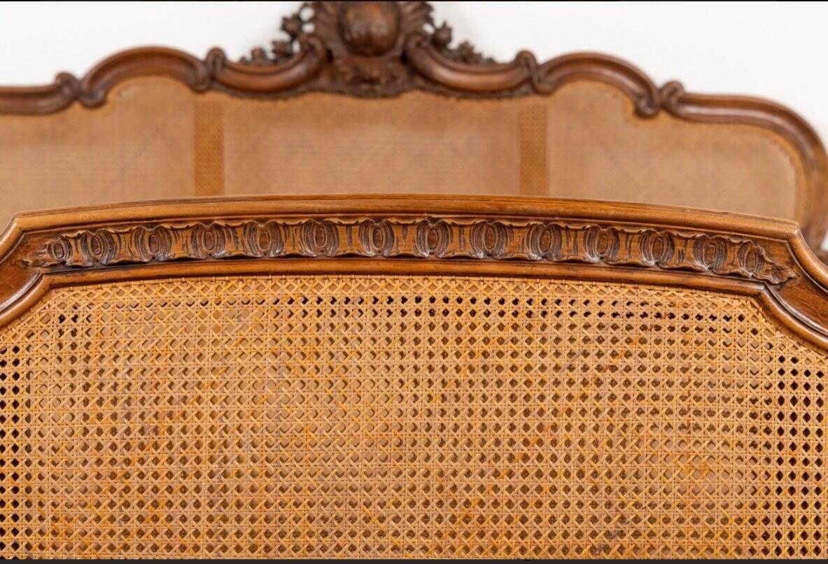 Louis XV style bed in carved and caned beech