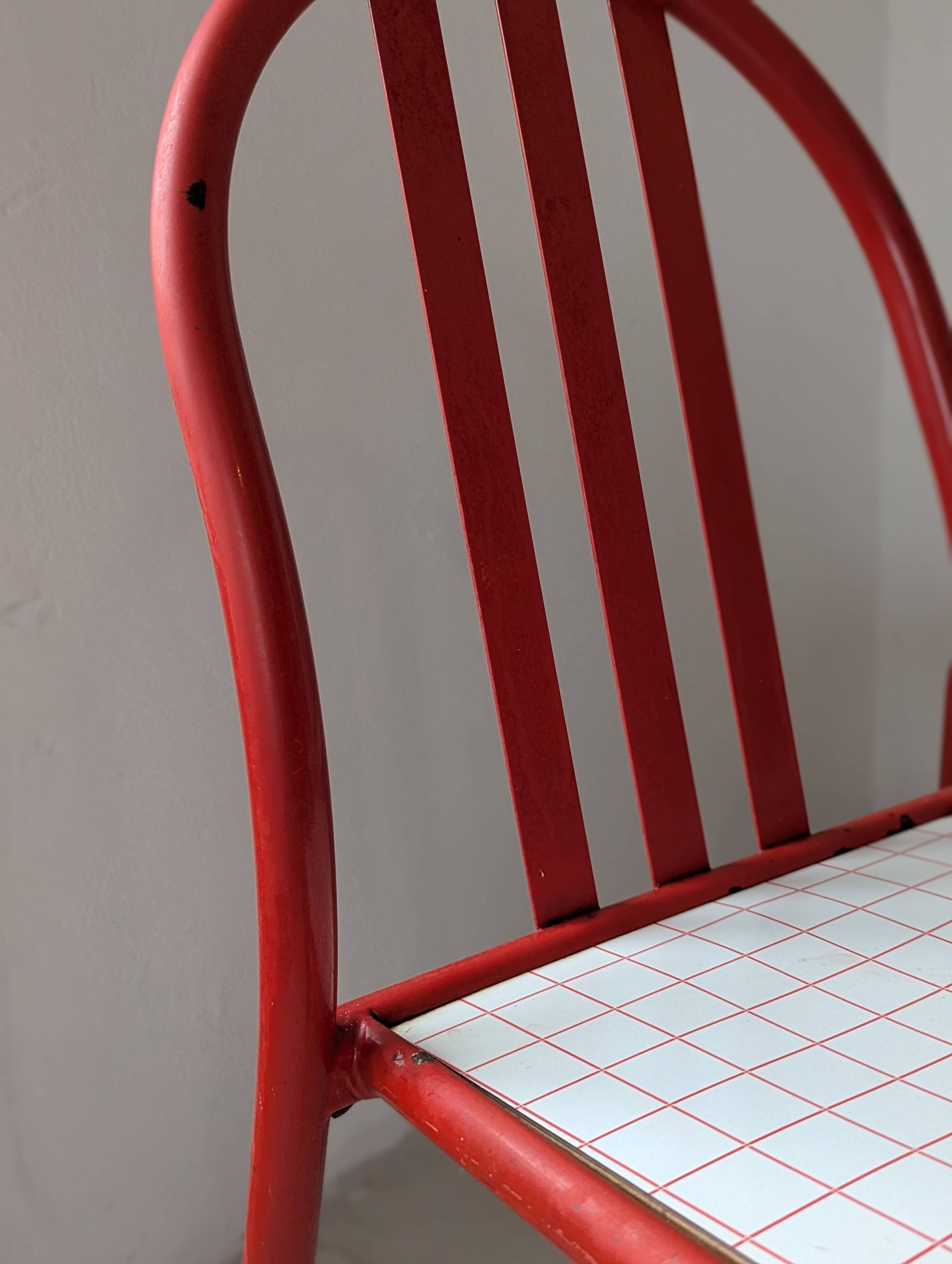 Set of 4 modernist red metal chairs