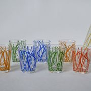 Colorful designer set composed of 7 liqueur glasses and a seventies 70s carafe