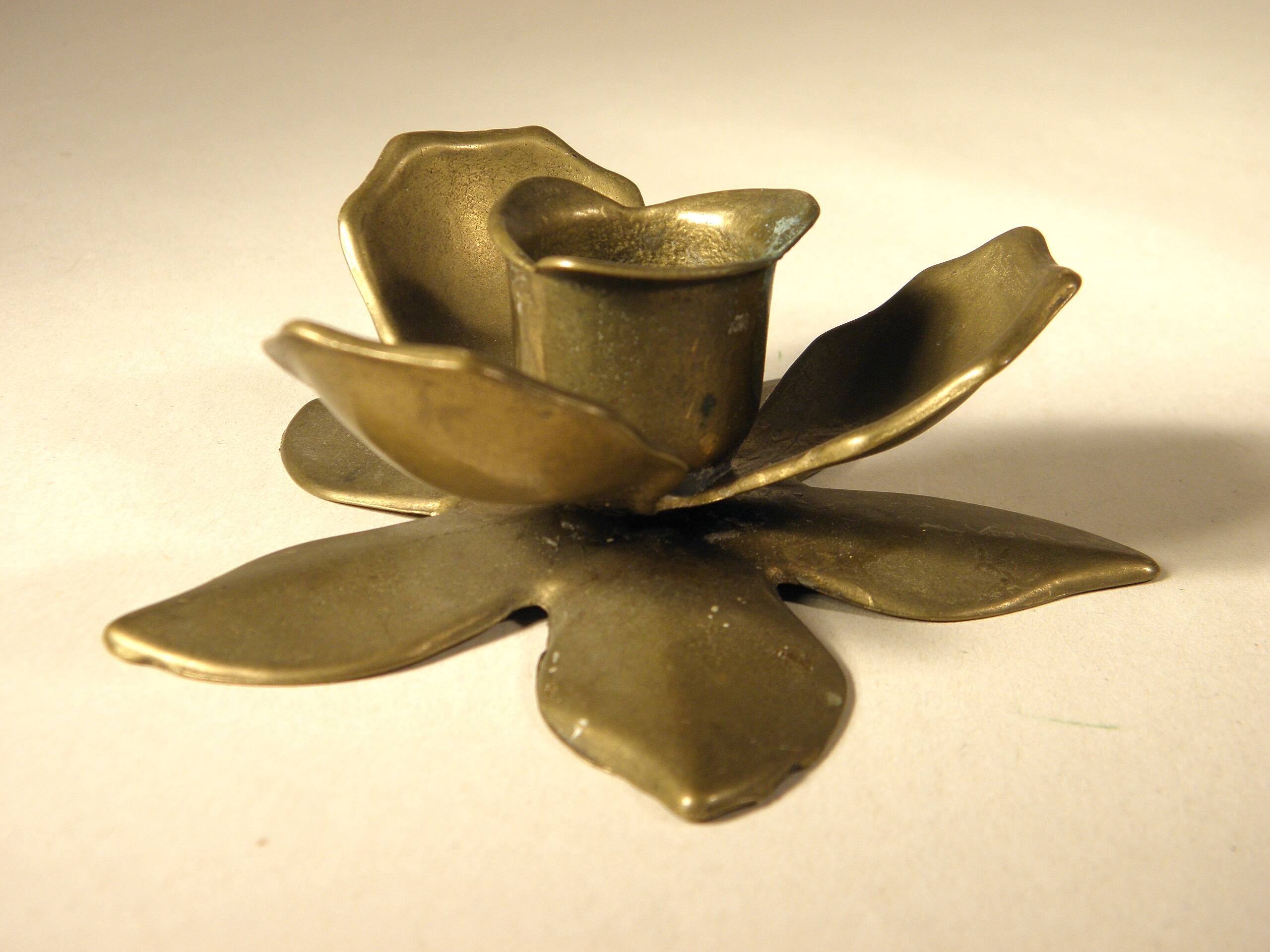 Brass flower candle holder