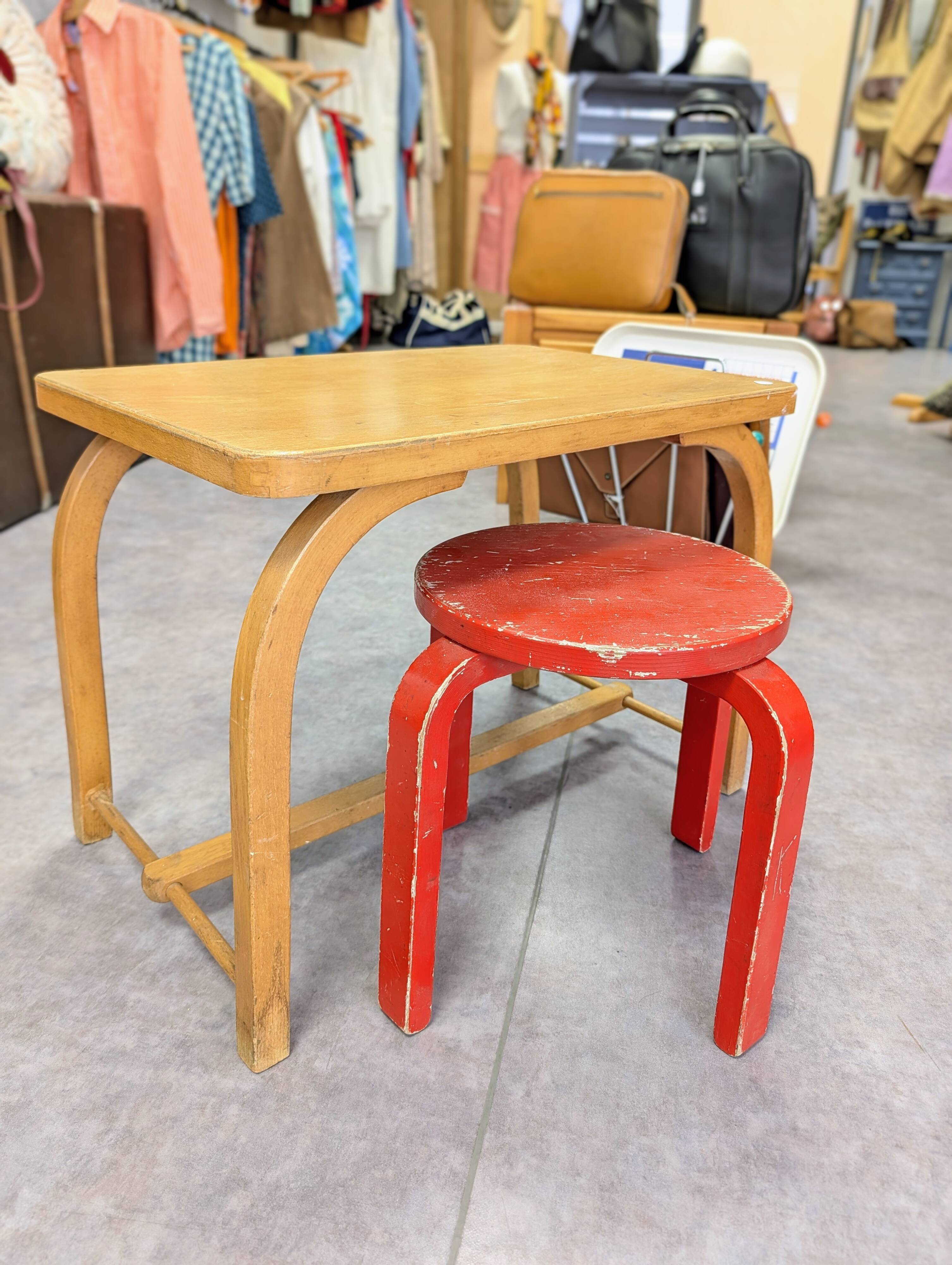 Old curved wooden children's desk.