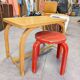 Old curved wooden children's desk.