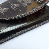 Silver and tortoiseshell letter clip