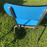 Two blue chairs in formica