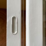 Library showcase ivory white sliding doors