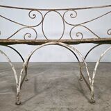 Beautiful curved garden bench from the late 19th century in iron.
