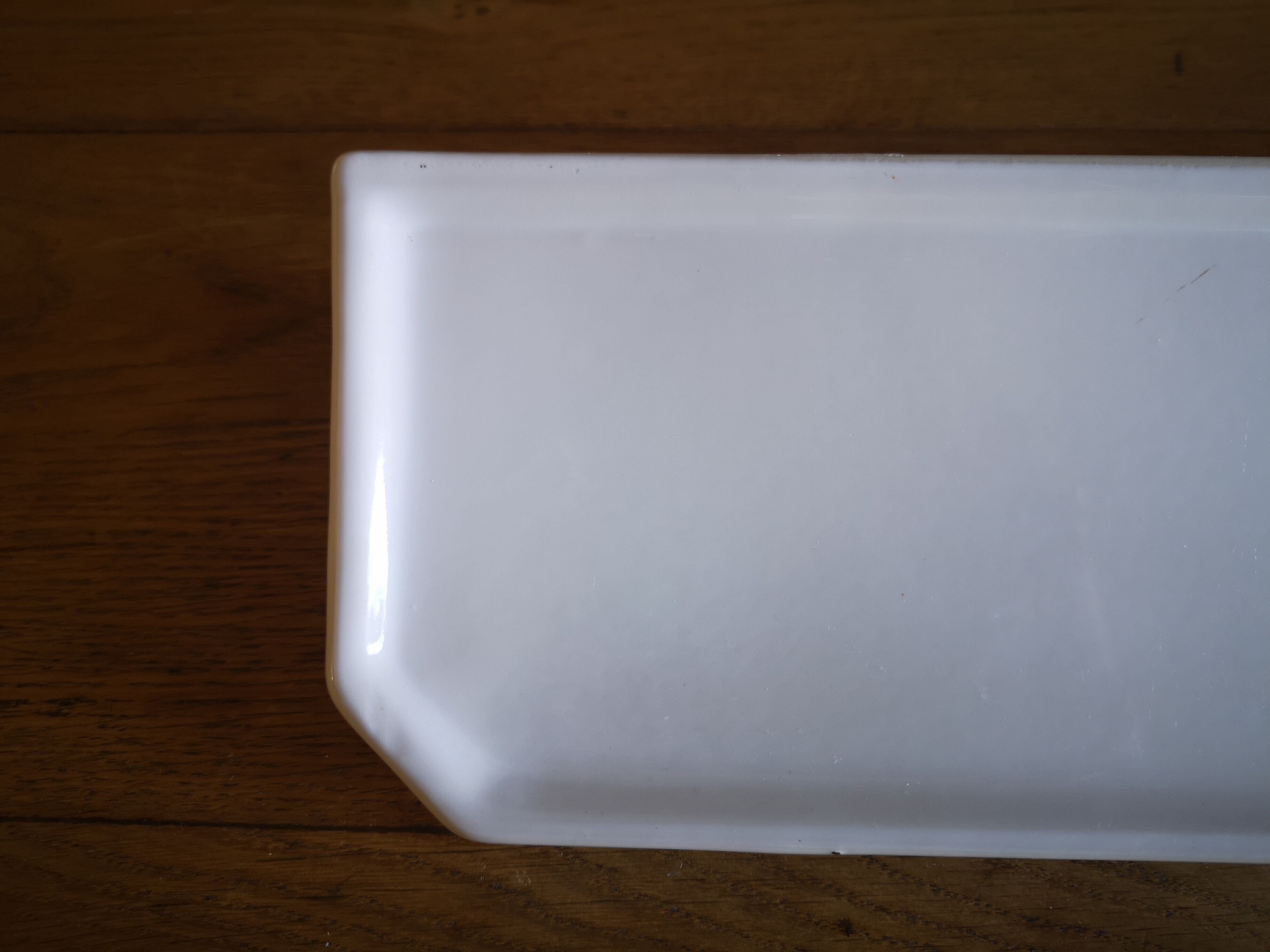 White porcelain wall shelf