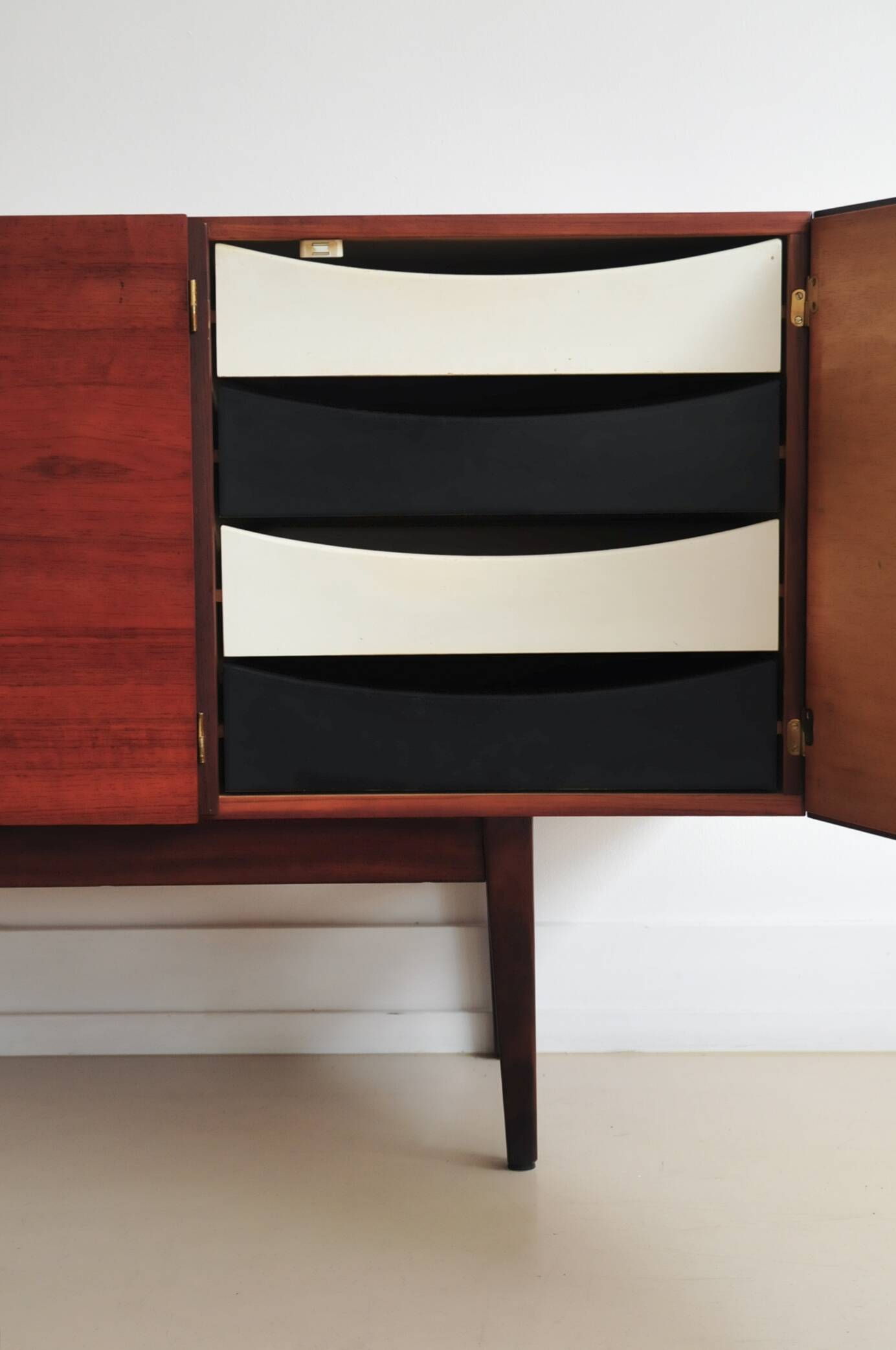 vintage Danish sideboard with black and white drawers