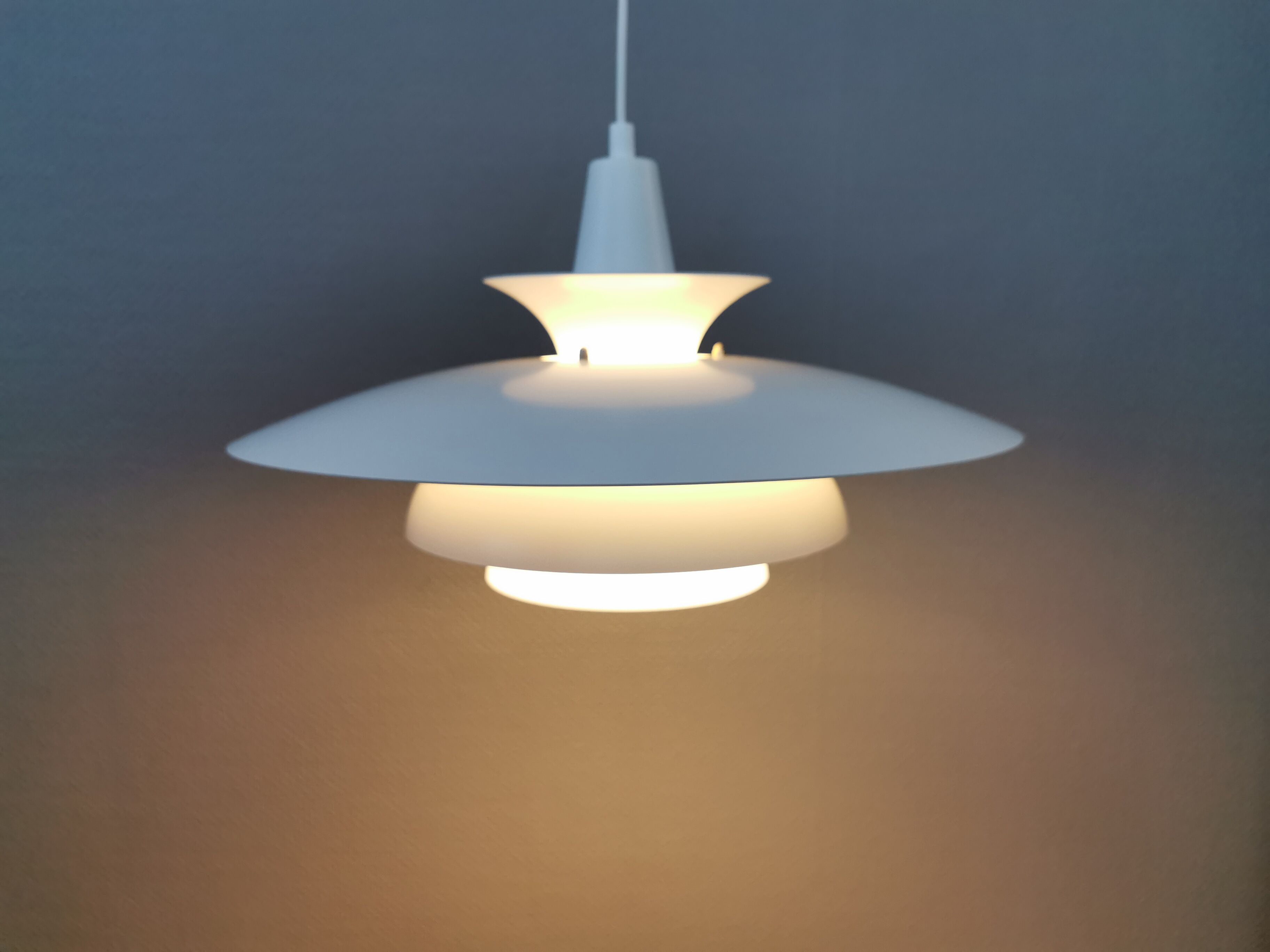 Classic danish designed hanging lamp from the 80s, in white lacquered metal