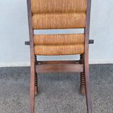Vintage armchair in straw and brutalist wood