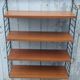 Wall shelf in Teak veneer and black metal, Nisse Strinning, 60s