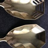 Pair of serving spoons in silver hallmark neck brace