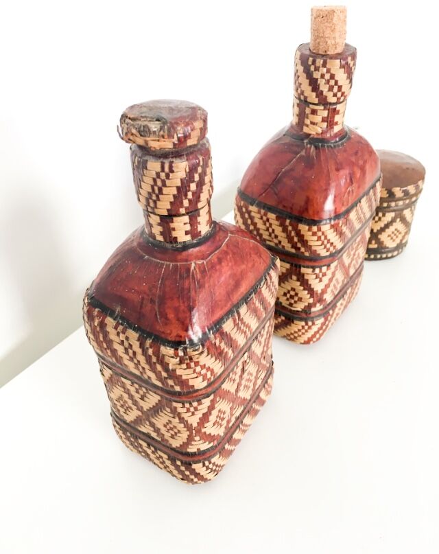 Lot of 2 ethnic leather-wrapped bottles and box