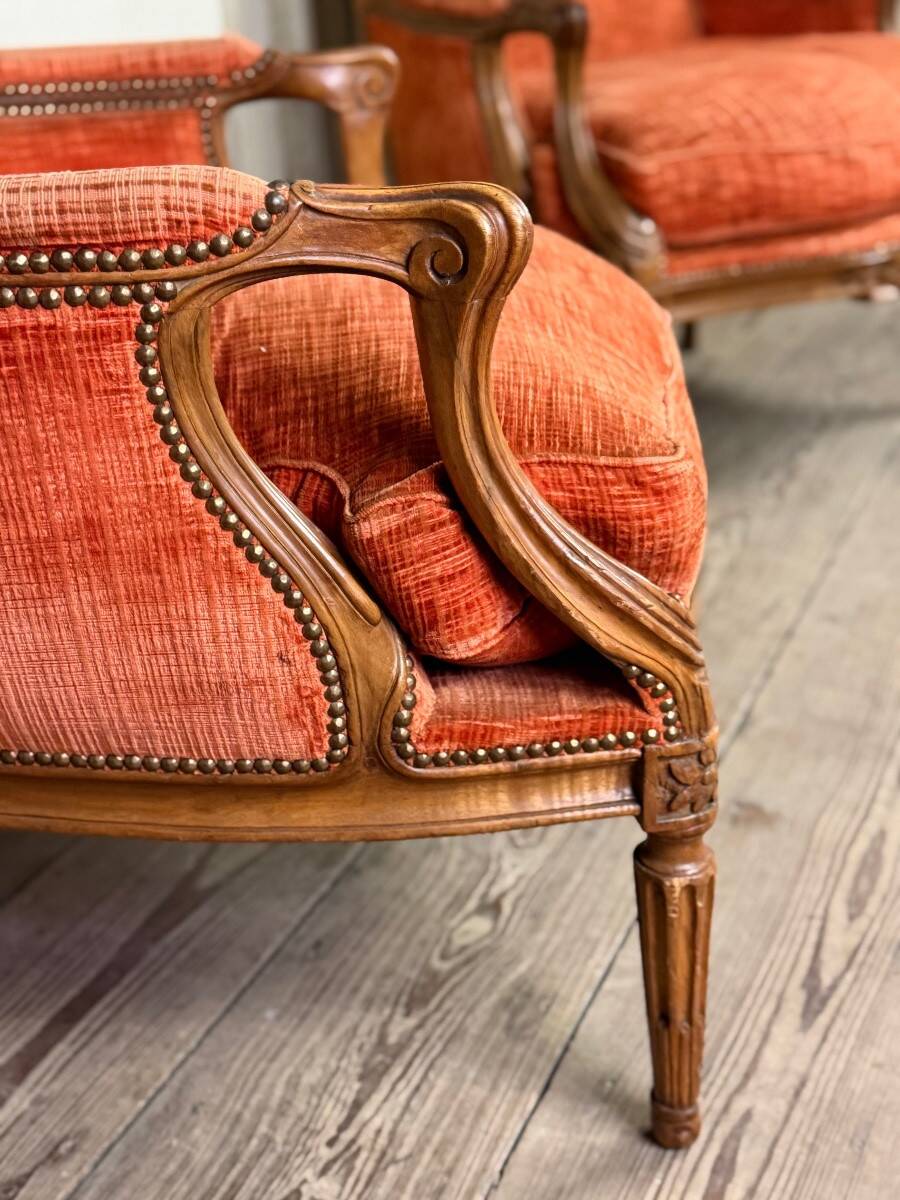 Pair of transitional carved wooden armchairs, 18th century